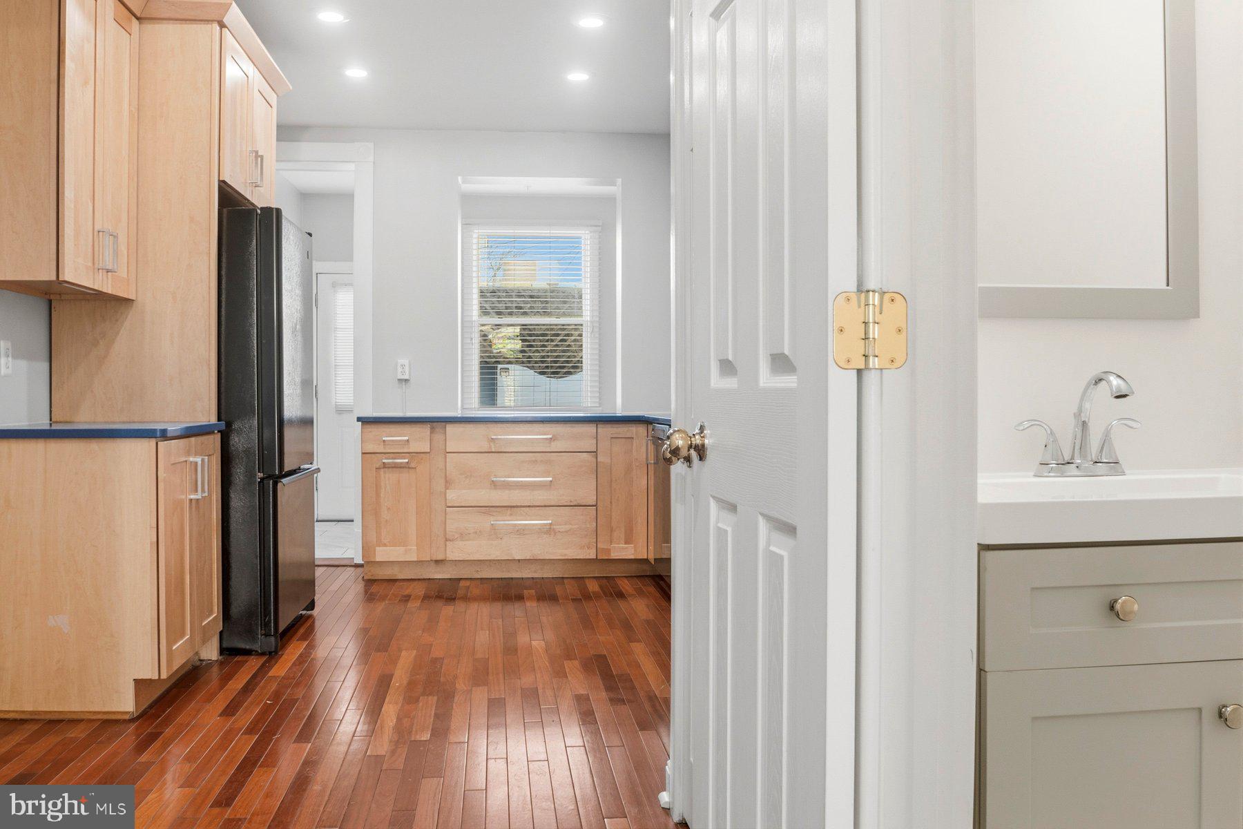 2510 Fleet Street Baltimore, MD 21224 - Photo 14 of 45 Main level half bathroom. Convenient!