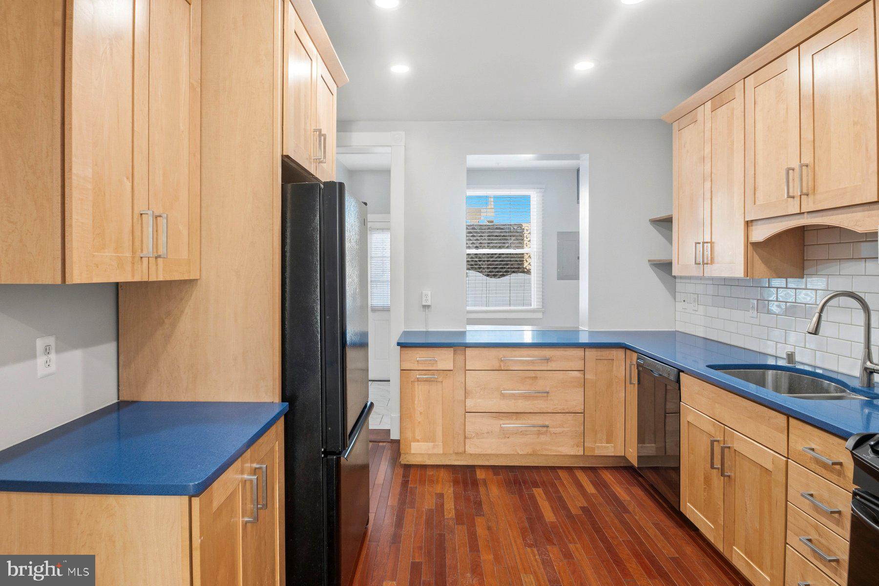 2510 Fleet Street Baltimore, MD 21224 - Photo 19 of 45 More cabinet storage around the fridge.