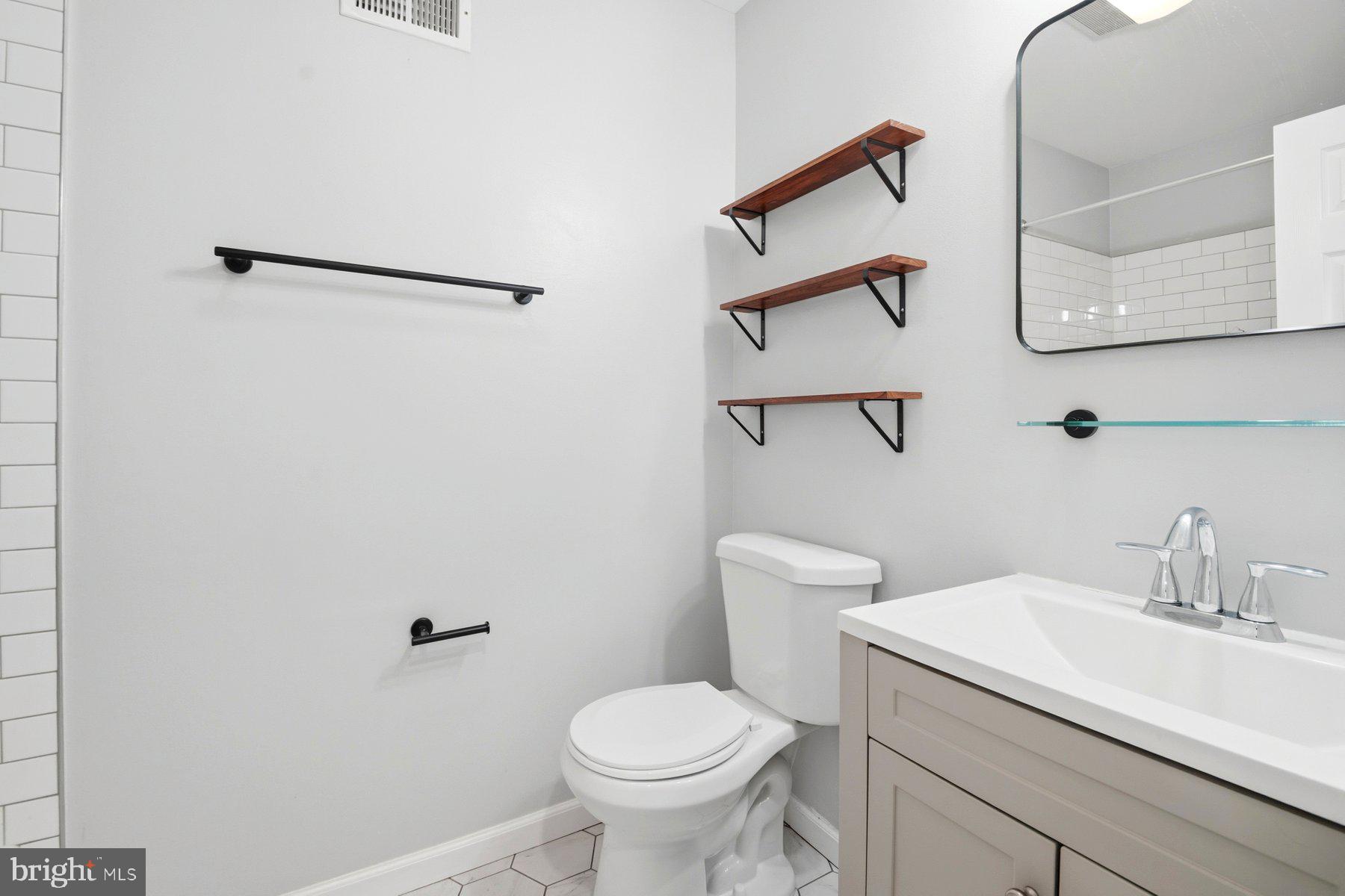 2510 Fleet Street Baltimore, MD 21224 - Photo 27 of 45 Updated full bathroom on upper level