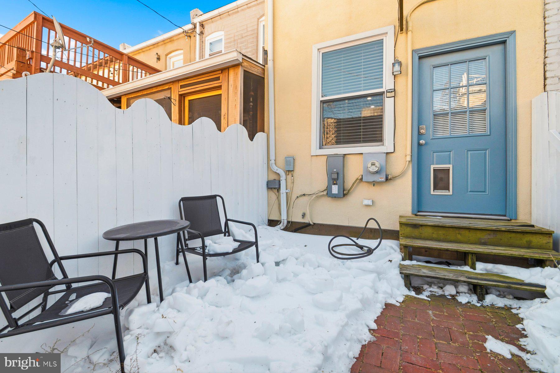 2510 Fleet Street Baltimore, MD 21224 - Photo 38 of 45 Enclosed patio. Small pup? Dog door for in and out