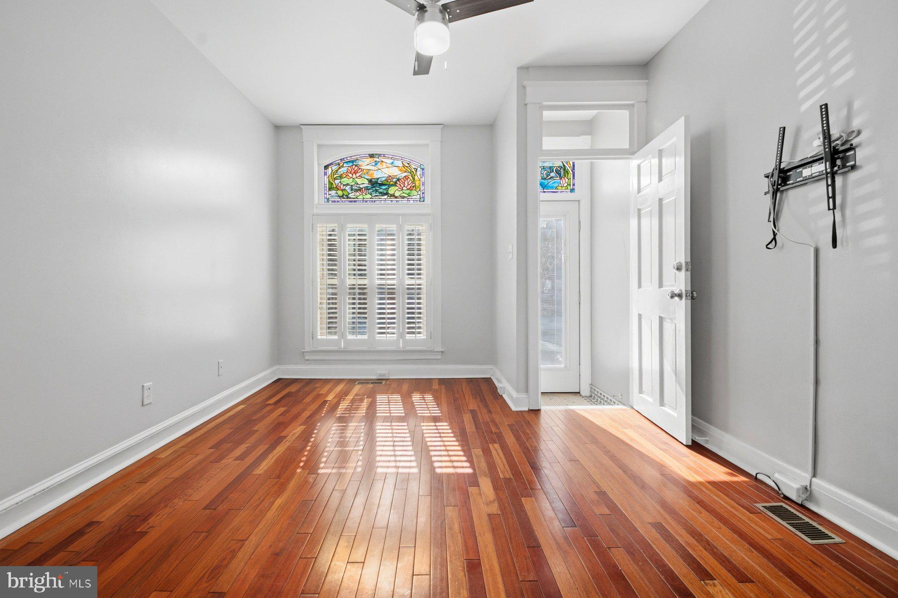 2510 Fleet Street Baltimore, MD 21224 - Photo 6 of 45 Abundant natural light. Beautiful stained glass.