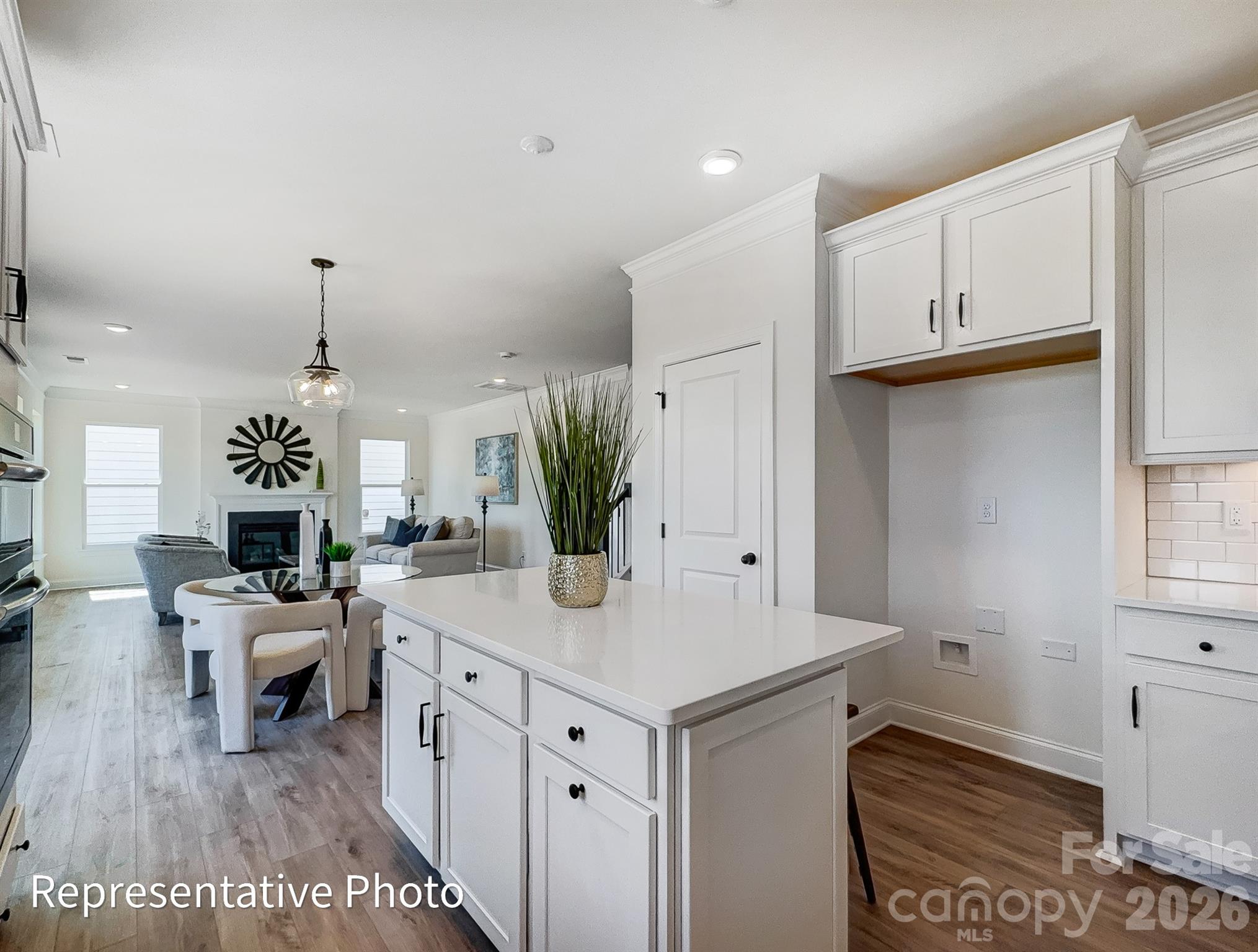 2608 Wild Azalea Court Monroe, NC 28110 - Photo 11 of 26 a living room with furniture and a table