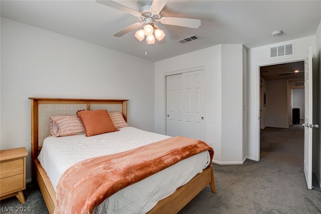 484 Filaree Place Henderson, NV 89015 - Photo 38 of 71 This cozy bedroom offers a tranquil retreat with soft textures and ample space.