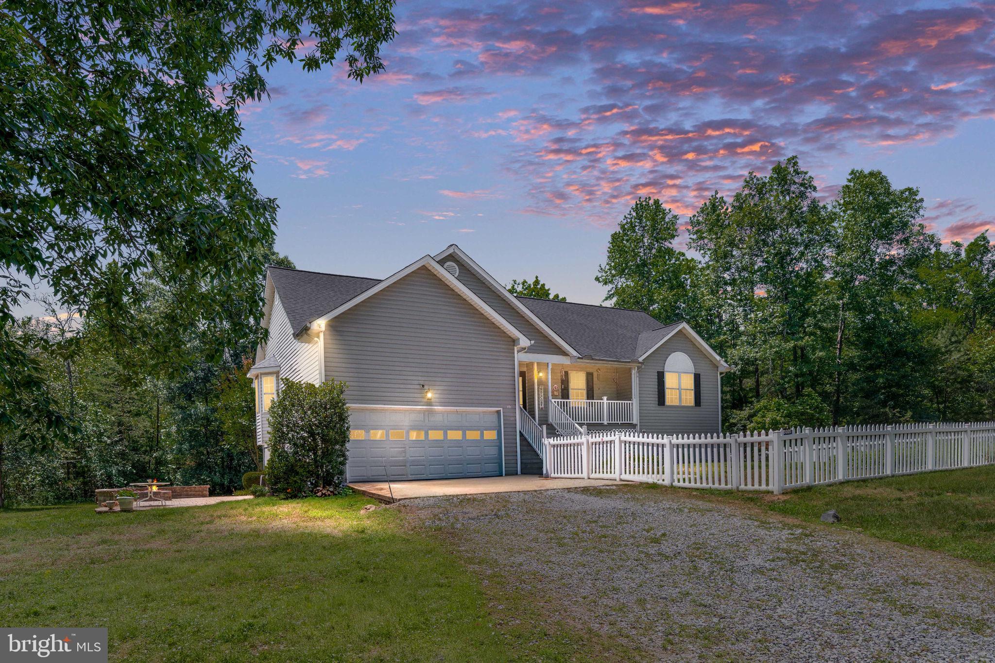 8009 Burrell Road Fredericksburg, VA 22407 - Photo 44 of 66 Charming home under a twilight sky.
