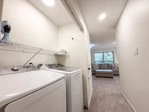a storage room with washer and dryer