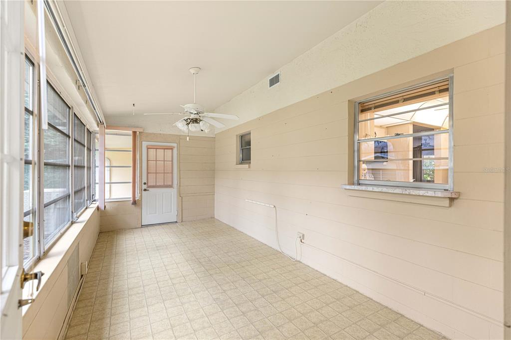 8665 Southwest 94 Street, Unit C Ocala, FL 34481 - Photo 12 of 29 a view of an empty room with a window