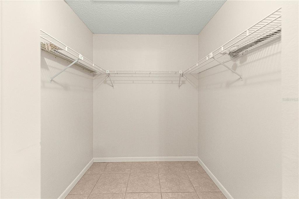 8665 Southwest 94 Street, Unit C Ocala, FL 34481 - Photo 21 of 29 a view of an empty walk in closet
