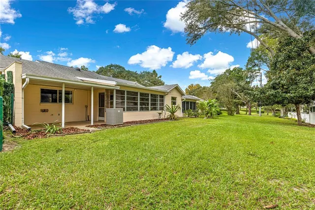 a view of a house with a big yard