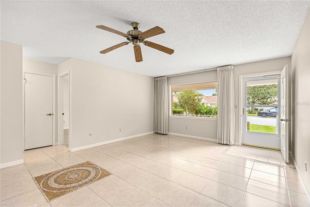 8665 Southwest 94 Street, Unit C Ocala, FL 34481 - Photo 5 of 29 a view of an empty room and window