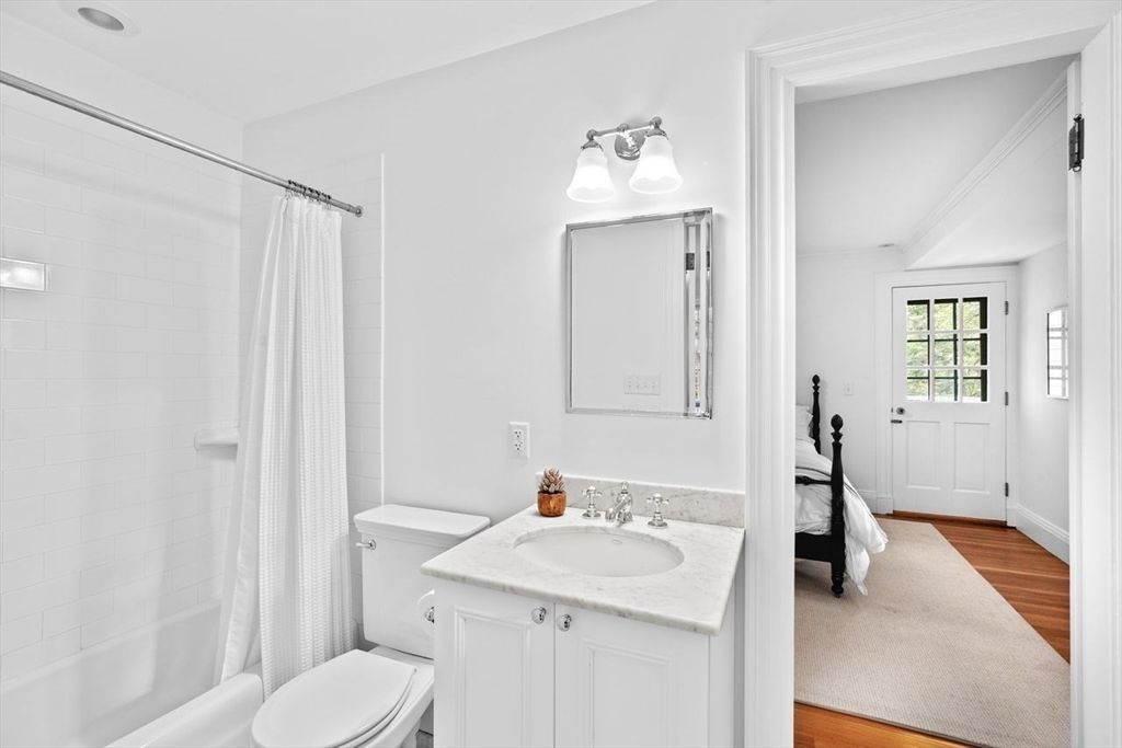 44 Montvale Road Newton, MA 02459 - Photo 21 of 37 a bathroom with a sink toilet and shower