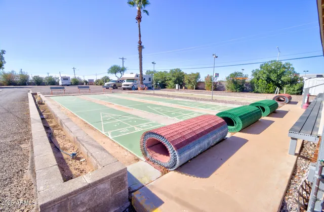a view of a terrace with outdoor seating and city view