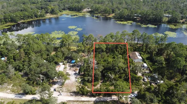 a view of swimming pool from a yard