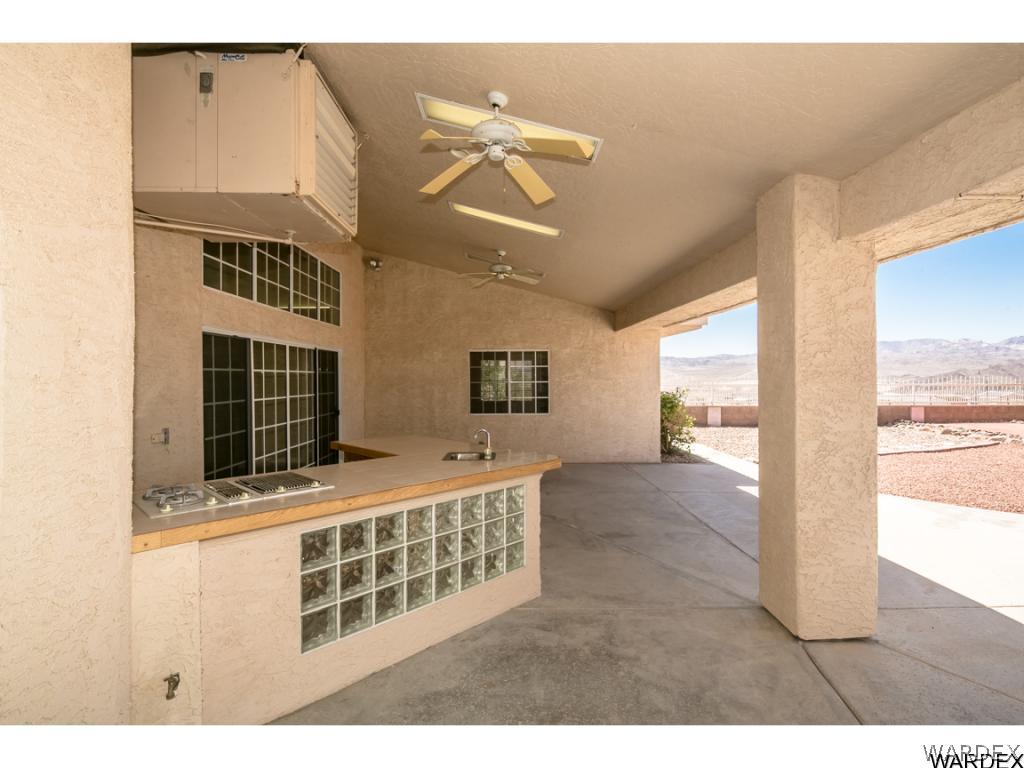 2043 Pegasus Ranch Road Bullhead City, AZ 86429 - Photo 28 of 32 Backyard party kitchen