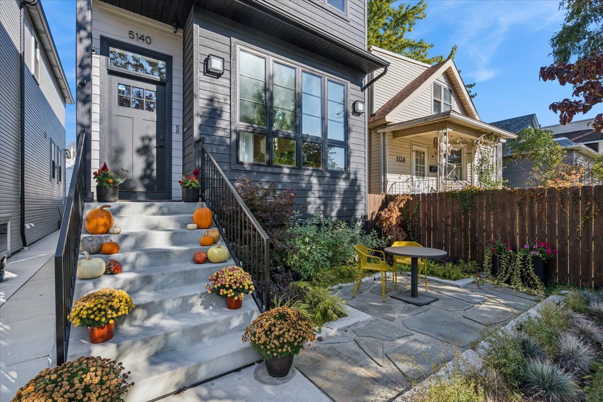 Undisclosed Address Chicago, IL 60630 - Photo 2 of 26 a garden view with a seating space