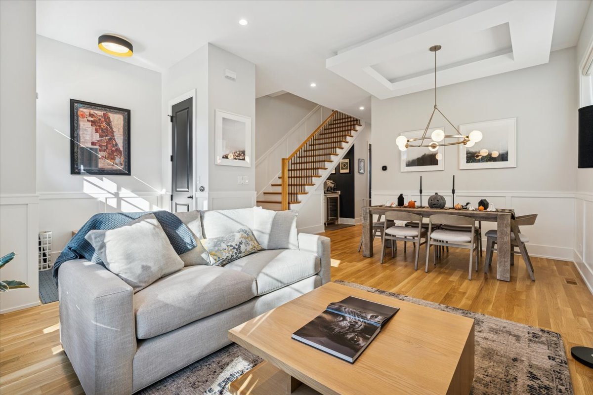 Undisclosed Address Chicago, IL 60630 - Photo 5 of 26 a living room with furniture wooden floor and a table