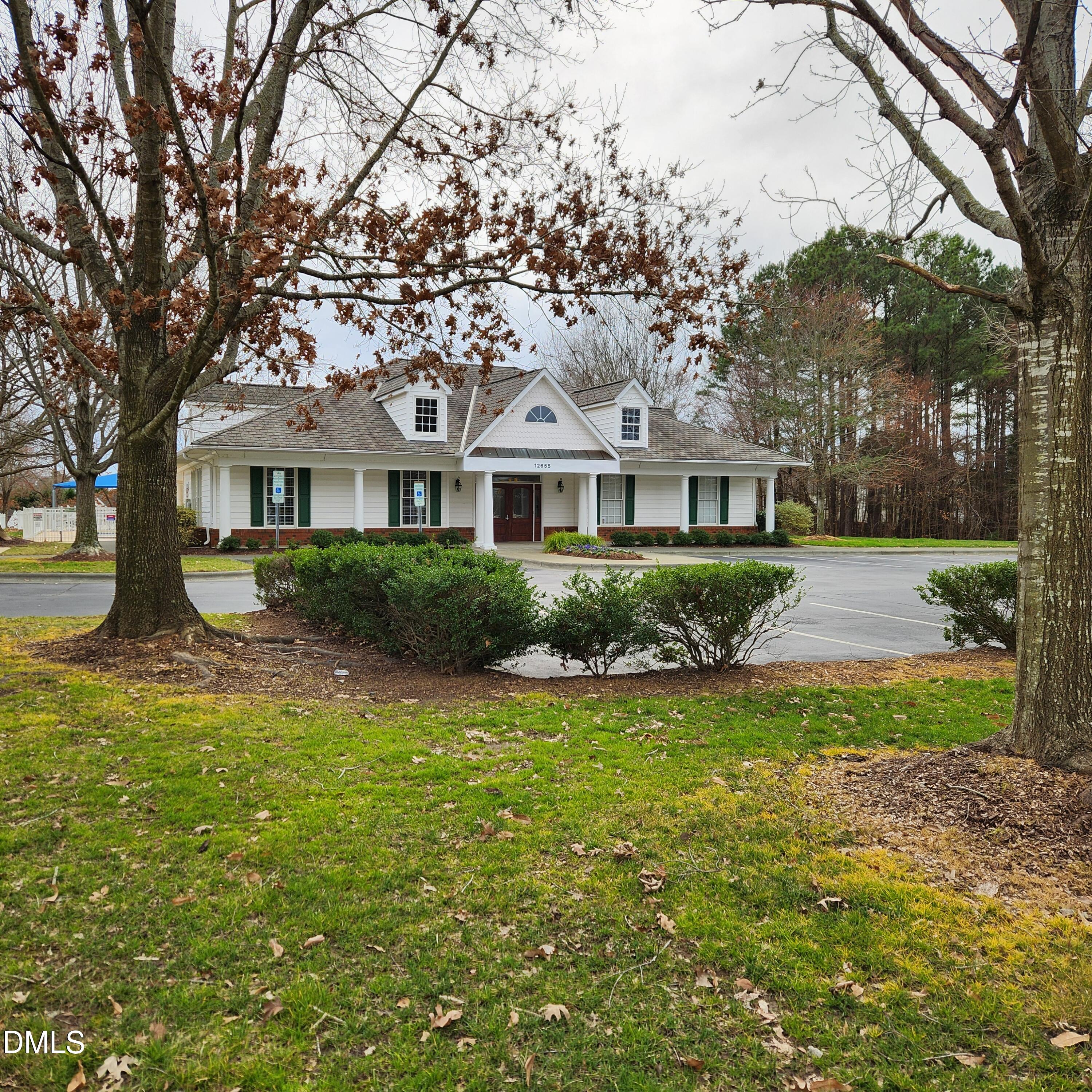 2630 Vega Court Raleigh, NC 27614 - Photo 14 of 17 a front view of a house with garden