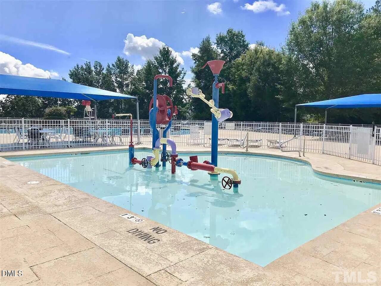 2630 Vega Court Raleigh, NC 27614 - Photo 5 of 17 swimming pool view with a outdoor space