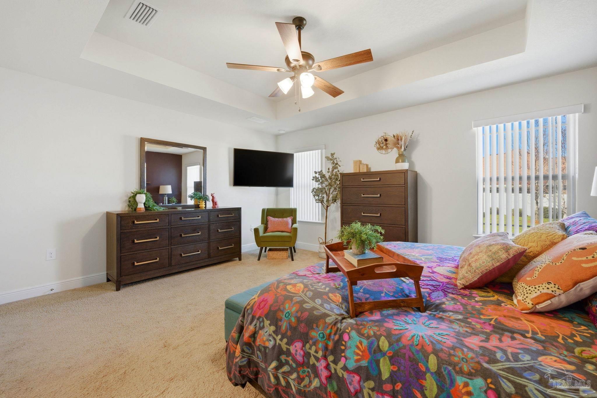 6022 Willsey Trail Crestview, FL 32539 - Photo 19 of 33 a bedroom with a bed window and a television