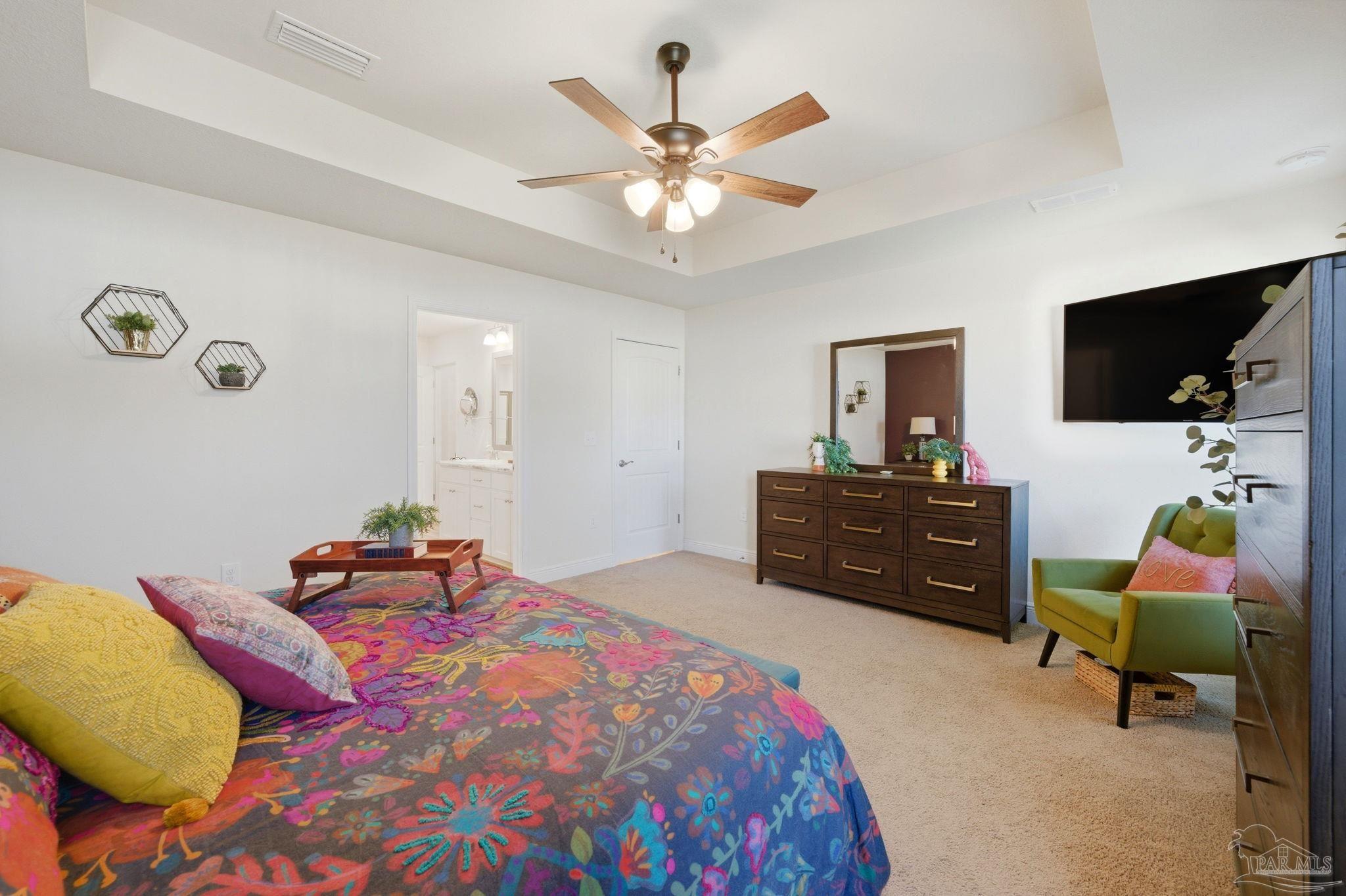 6022 Willsey Trail Crestview, FL 32539 - Photo 20 of 33 a bedroom with a bed and furniture