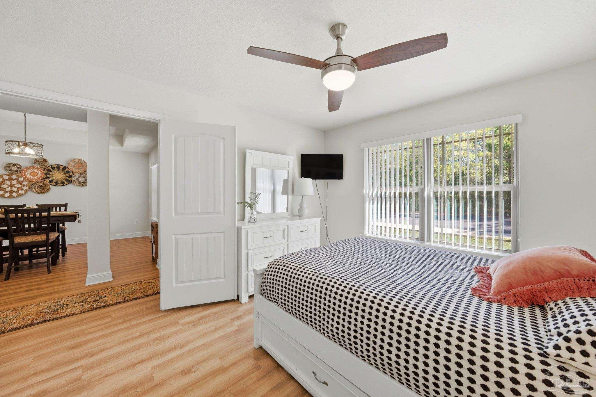 6022 Willsey Trail Crestview, FL 32539 - Photo 28 of 33 a bedroom with a bed and a window