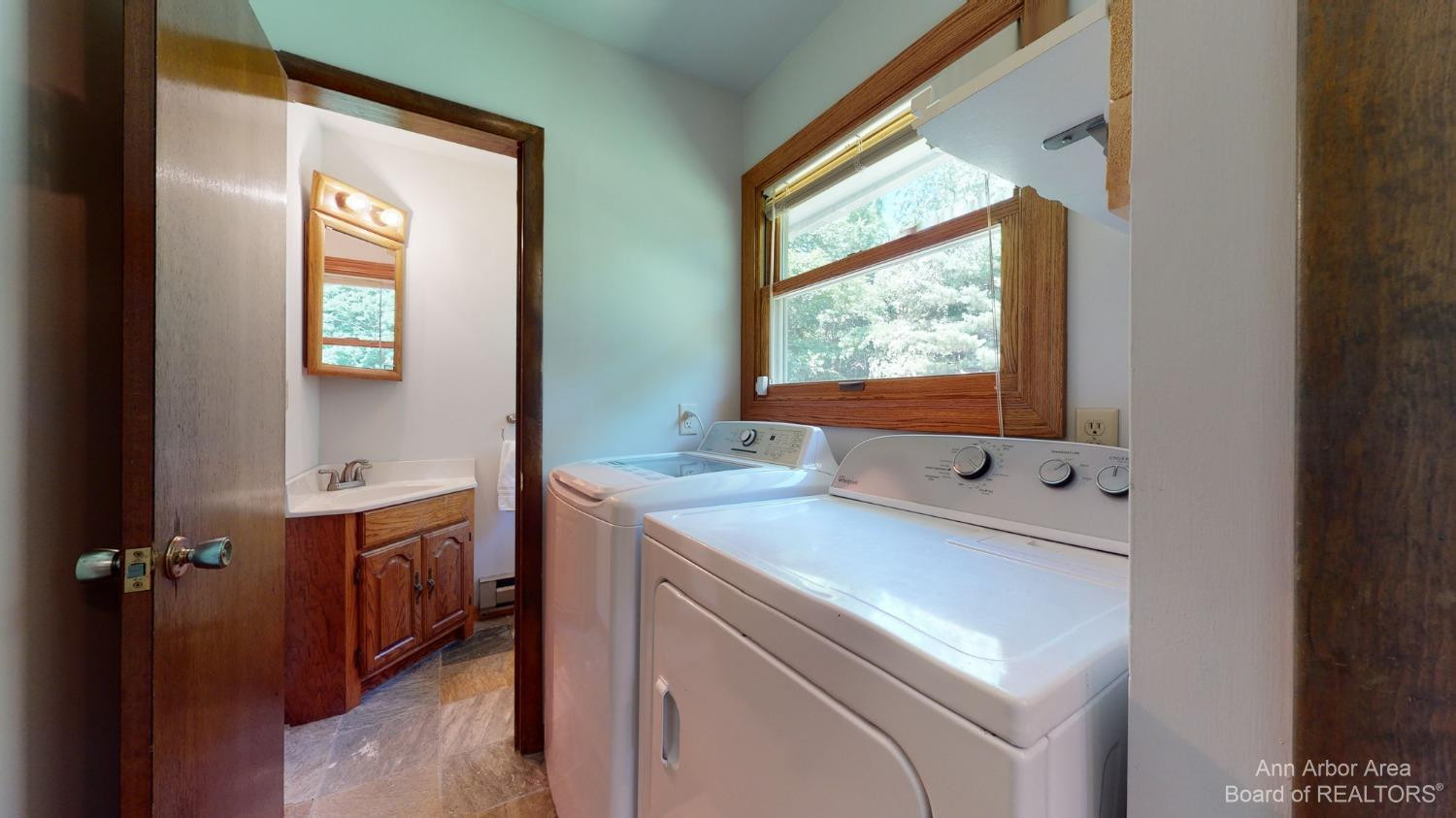 7391 Bush Road Chelsea, MI 48118 - Photo 15 of 38 First Floor Laundry - Leads to Half Bath