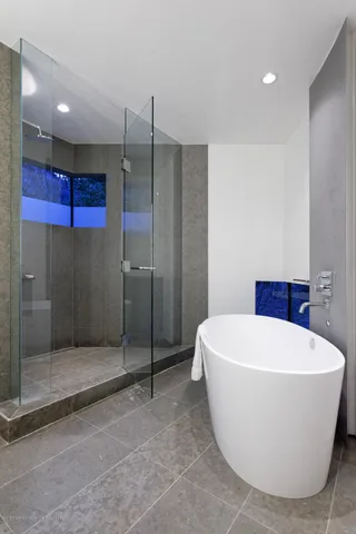 a bedroom with bed and window