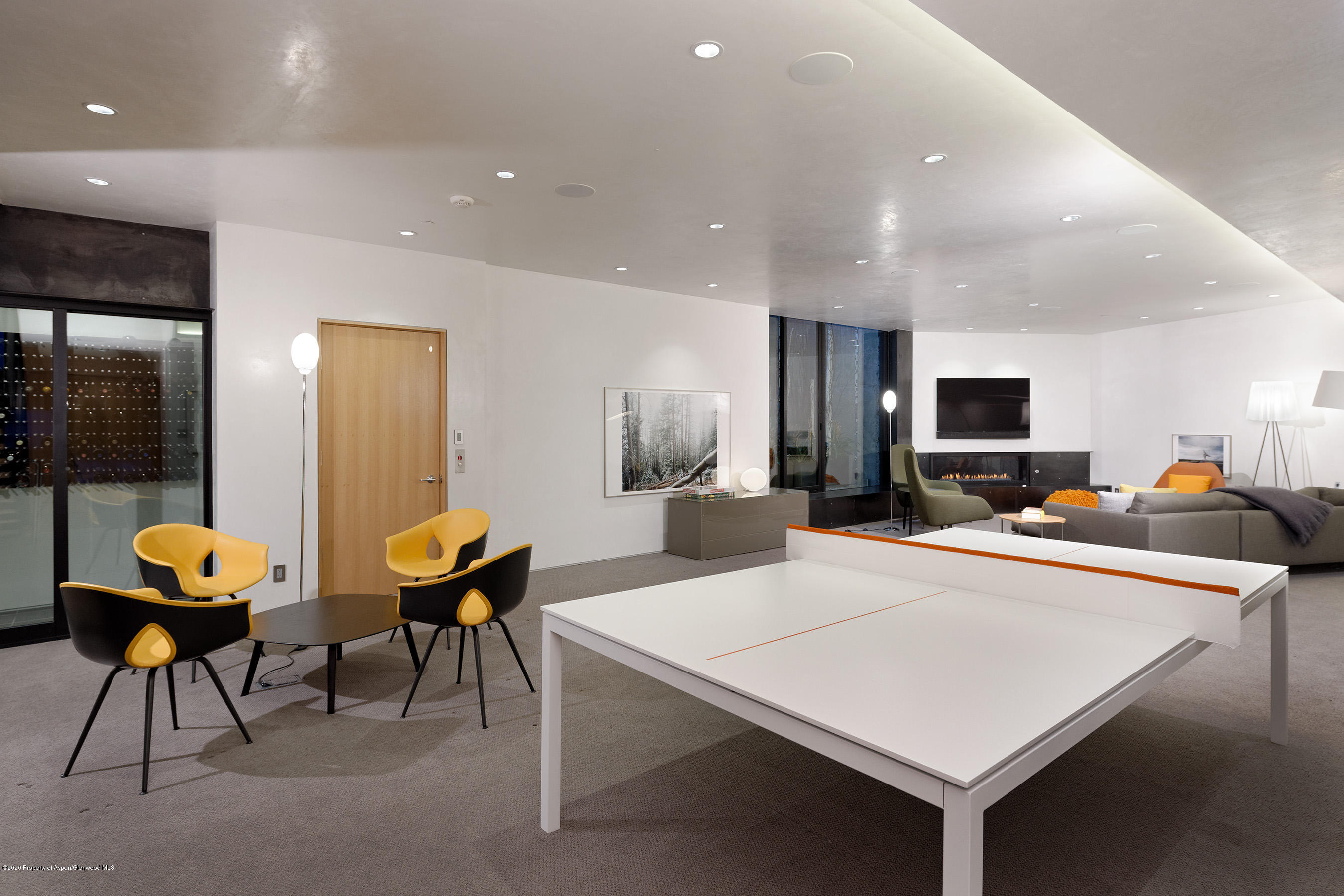 1118 Waters Avenue Aspen, CO 81611 - Photo 28 of 30 a view of a dining room with furniture and wooden floor