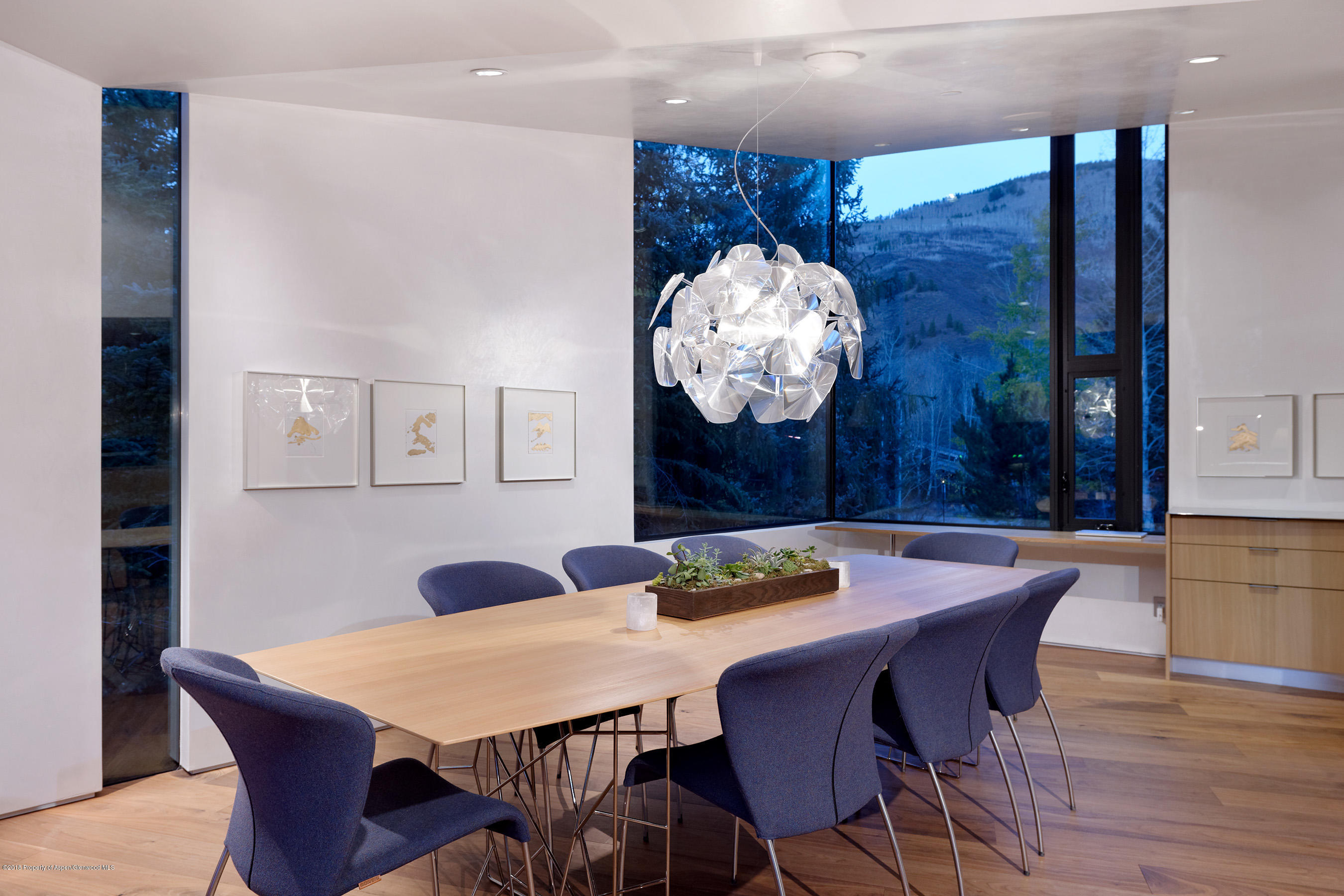 1118 Waters Avenue Aspen, CO 81611 - Photo 6 of 30 a view of a dining room with furniture and wooden floor