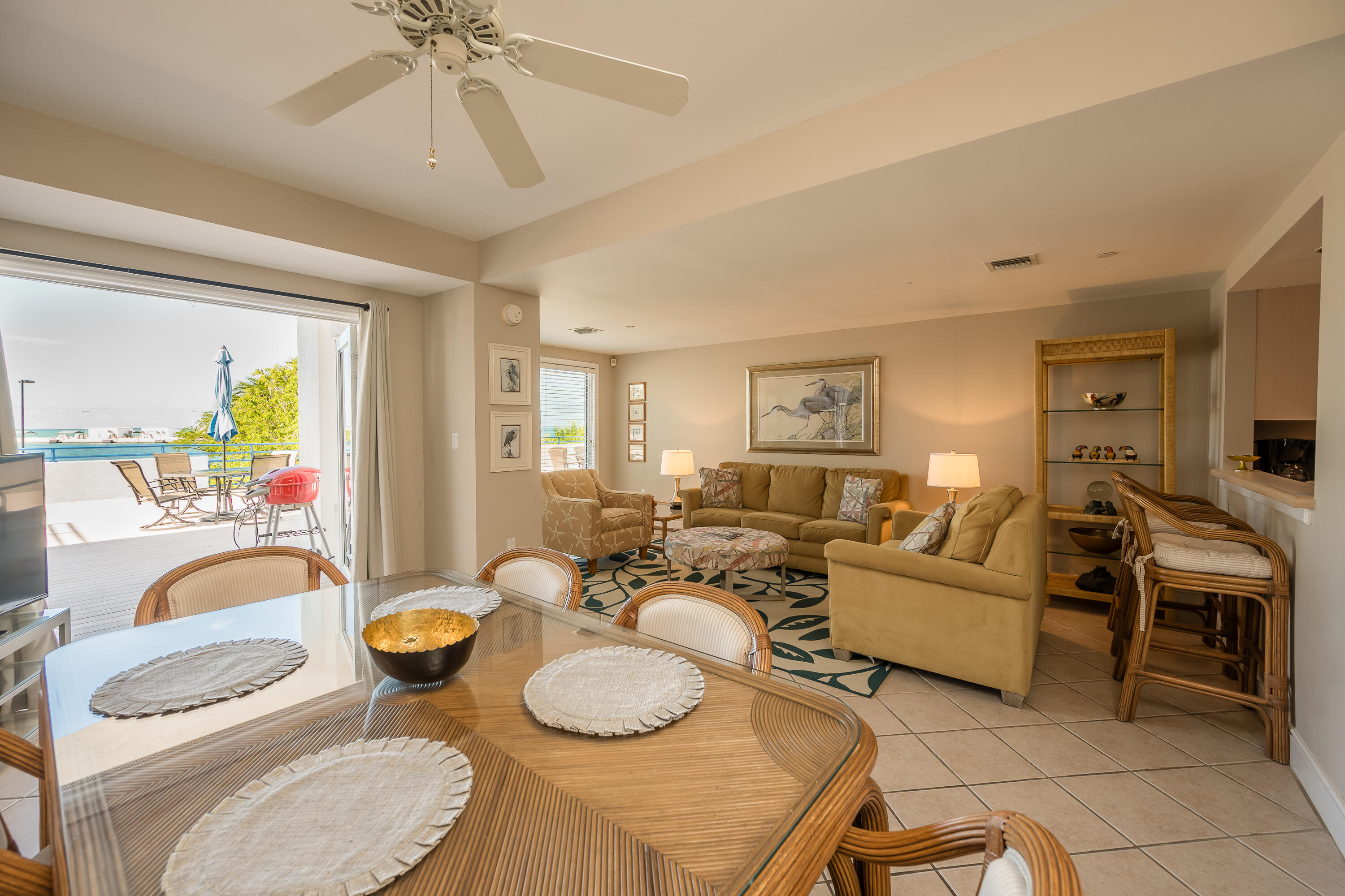 105 Front Street, Unit 119 Key West, FL 33040 - Photo 3 of 18 a living room with furniture and a wooden floor
