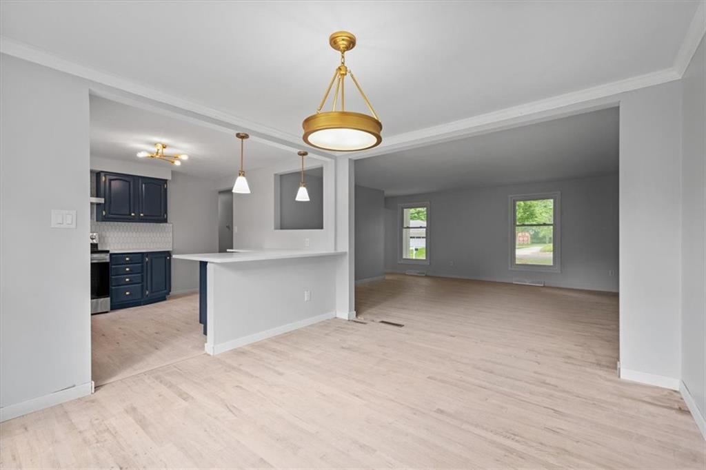 457 Inwood Road Pittsburgh, PA 15237 - Photo 22 of 39 a view of a kitchen with a sink and a chandelier