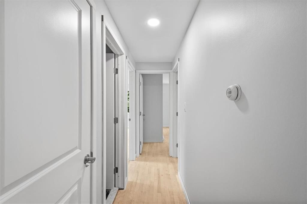 457 Inwood Road Pittsburgh, PA 15237 - Photo 23 of 39 a view of a hallway with wooden floor