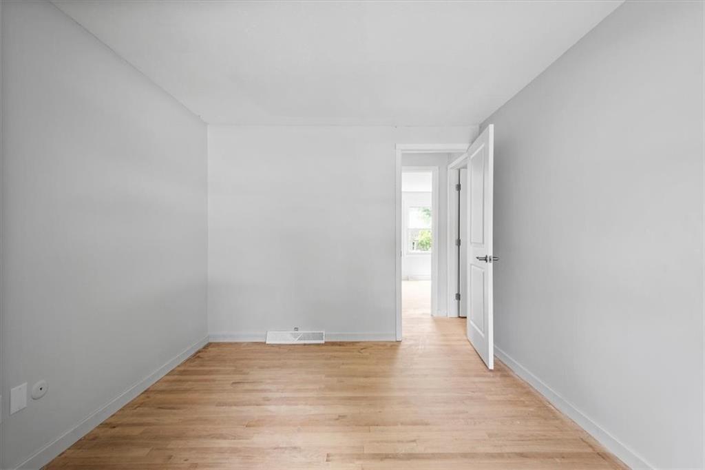 457 Inwood Road Pittsburgh, PA 15237 - Photo 34 of 39 a view of an empty room with wooden floor