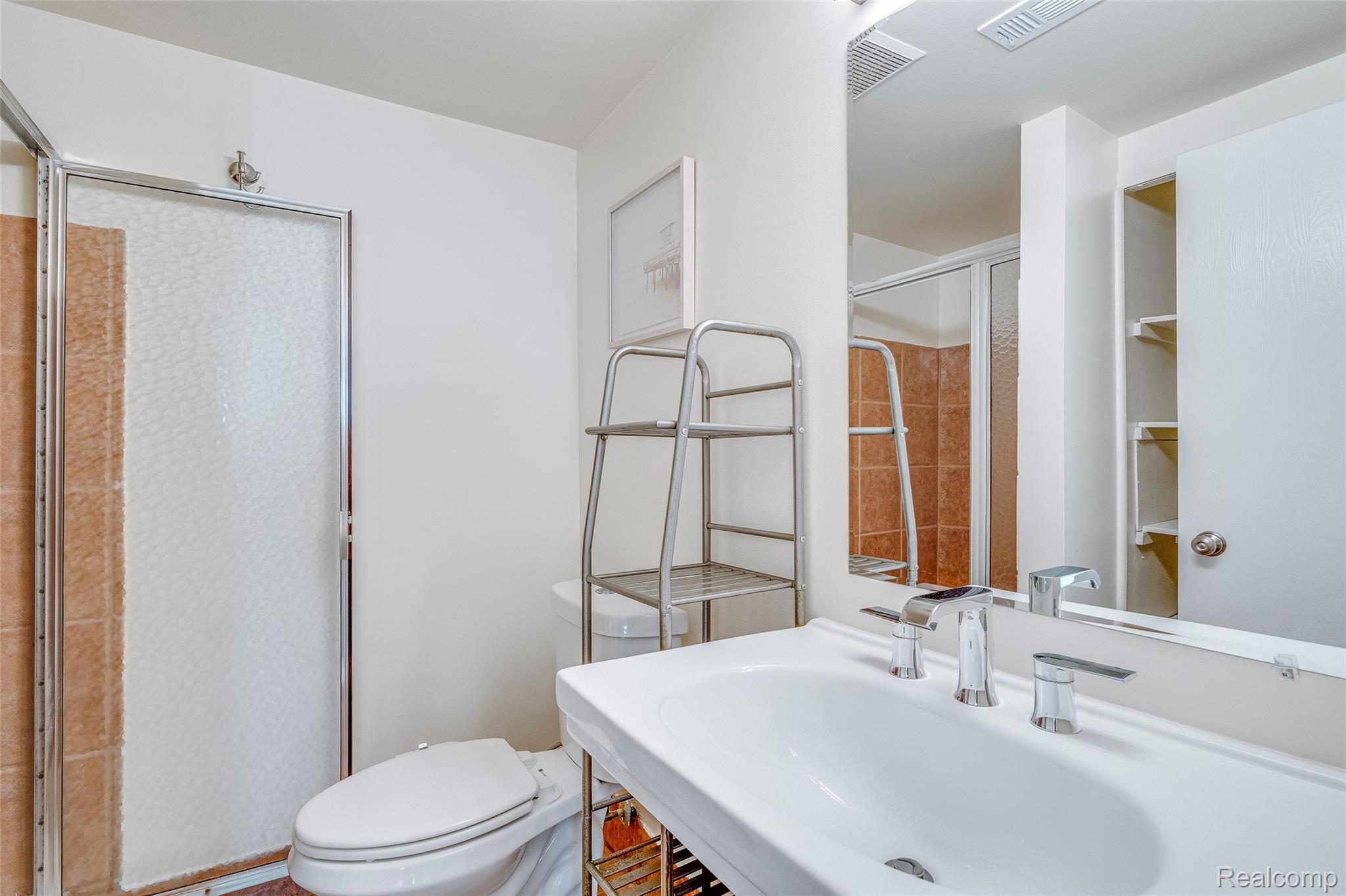 29860 West 12 Mile Road, Unit 604 Farmington, MI 48334 - Photo 16 of 26 Bathroom with toilet and a stall shower