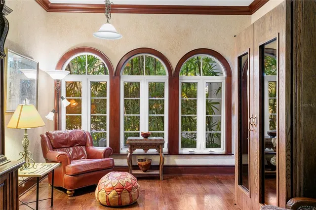 a view of a dining room with furniture window and outside view
