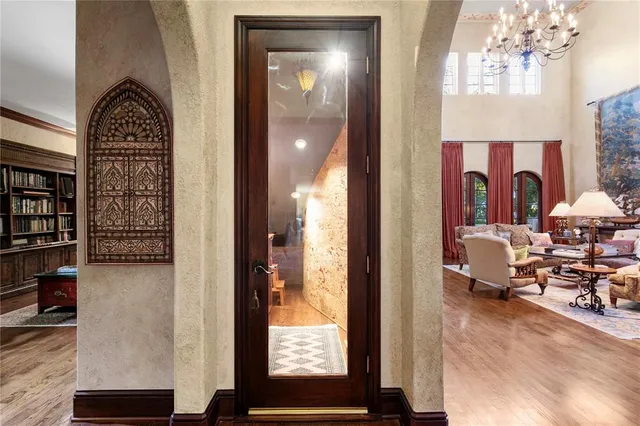 a bathroom with a double vanity sink a mirror a bathtub and a shower