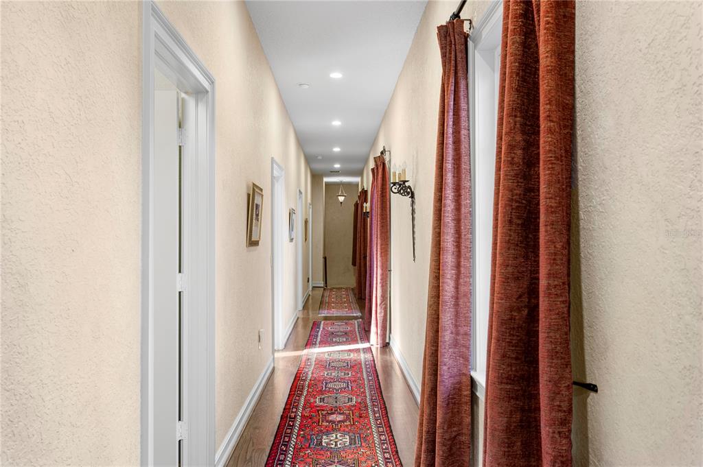 4803 West Woodmere Road Tampa, FL 33609 - Photo 35 of 80 a view of hallway with wooden floor
