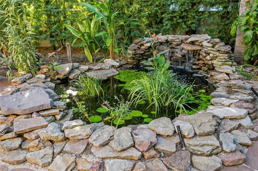 4803 West Woodmere Road Tampa, FL 33609 - Photo 59 of 80 a garden with lots of trees