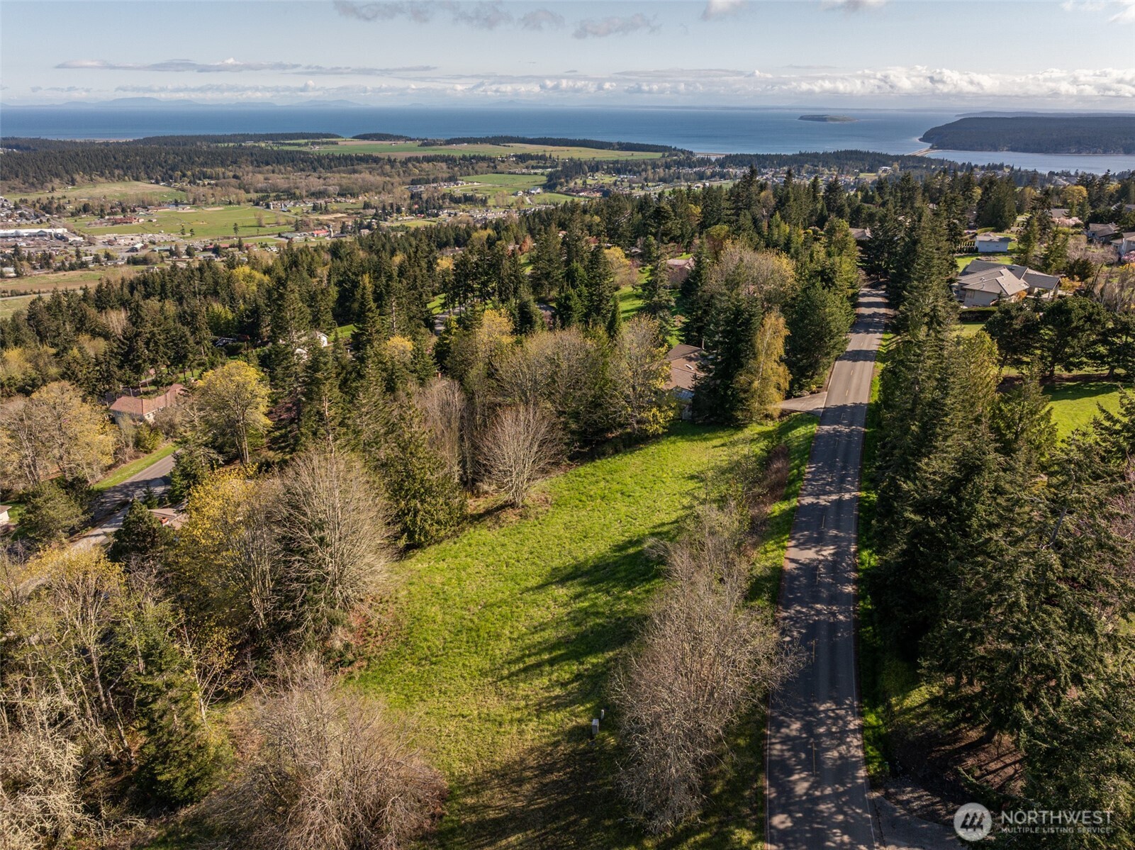 999 Ravens Ridge Road Sequim, WA 98382 - Photo 2 of 40 a view of city and ocean
