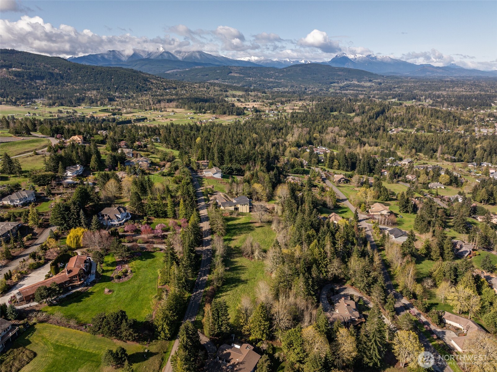 999 Ravens Ridge Road Sequim, WA 98382 - Photo 40 of 40 an aerial view of residential house and green space