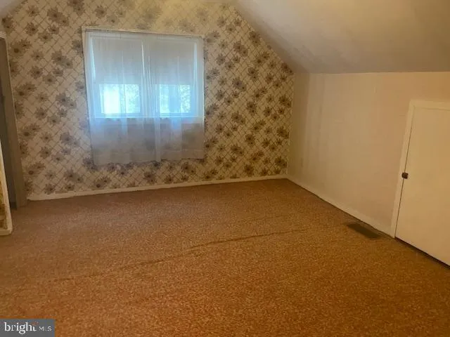 a view of a bathroom with a shower