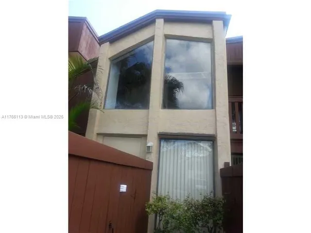 a view of a balcony with an entryway