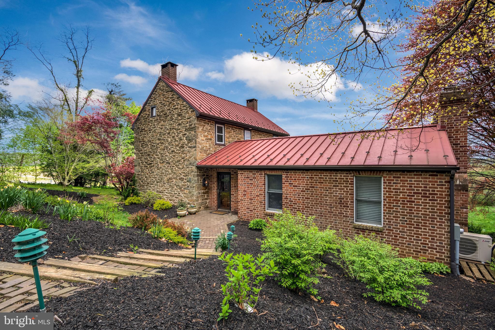 17262 Webb Road Stewartstown, PA 17363 - Photo 1 of 52 Gorgeous Stone and Brick Farmhouse