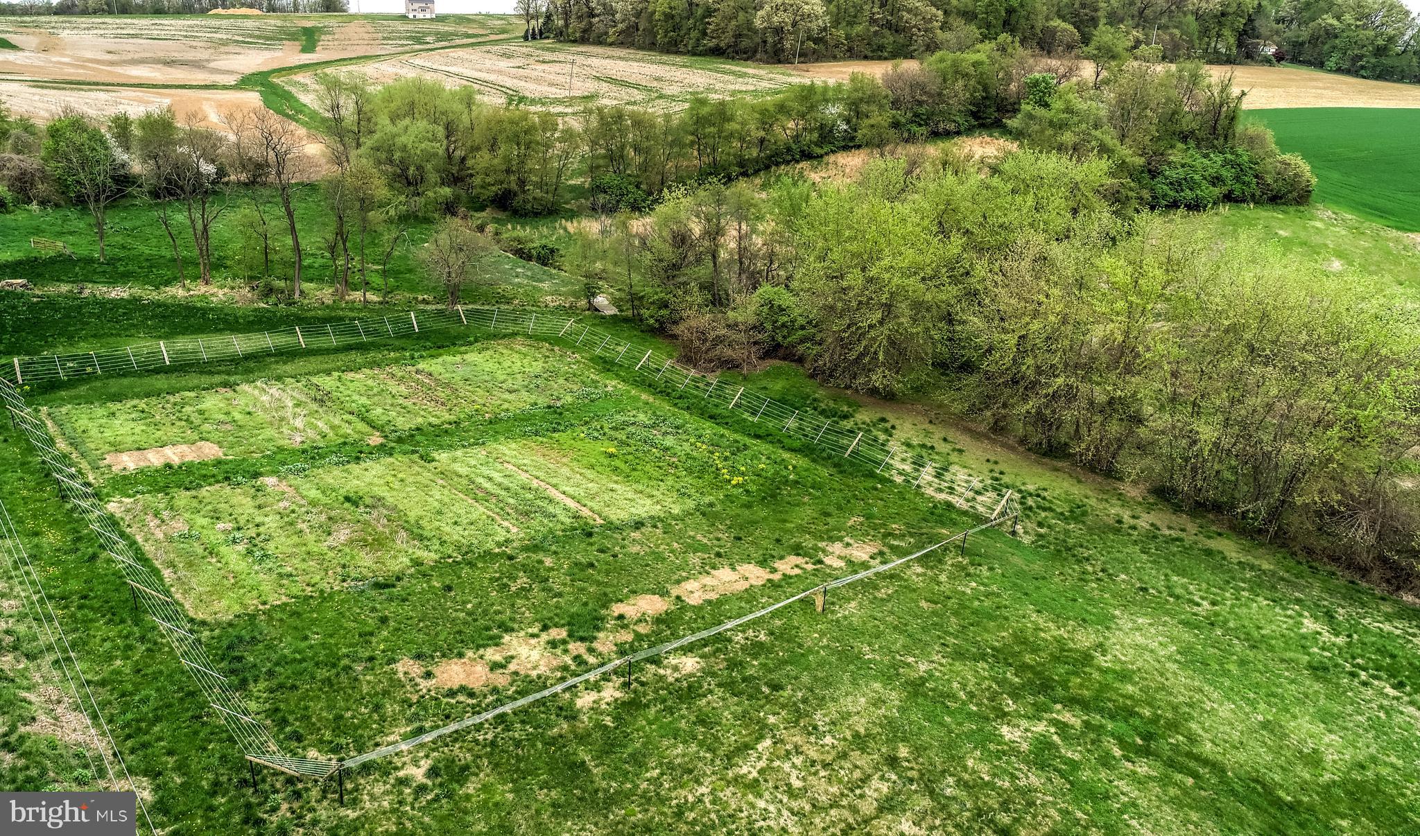 17262 Webb Road Stewartstown, PA 17363 - Photo 39 of 52 Fenced Plot Ready for Crops, Safe from Deer
