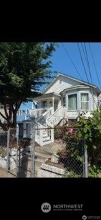 1414 East Fir Street Seattle, WA 98122 - Photo 2 of 30 a view of a house with a yard