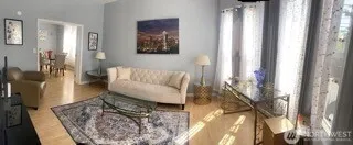 a living room with furniture and a couch