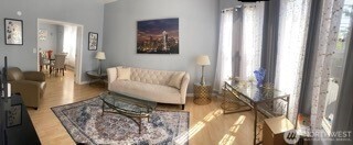 1414 East Fir Street Seattle, WA 98122 - Photo 23 of 30 a living room with furniture and a couch