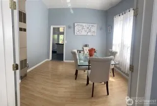 a workspace with furniture and window