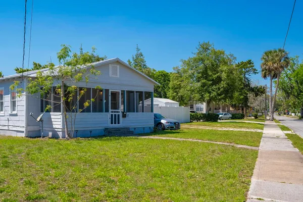 a view of a house with a swimming pool