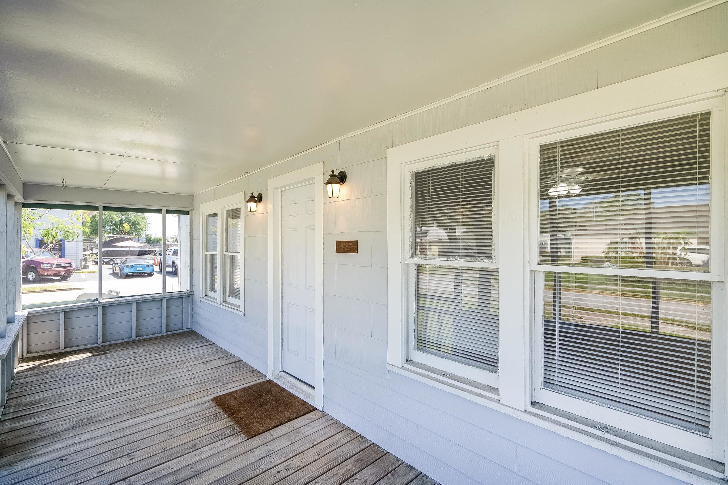 32 Grant Street St. Augustine, FL 32084 - Photo 5 of 24 a view of a bathroom with wooden floor and a window