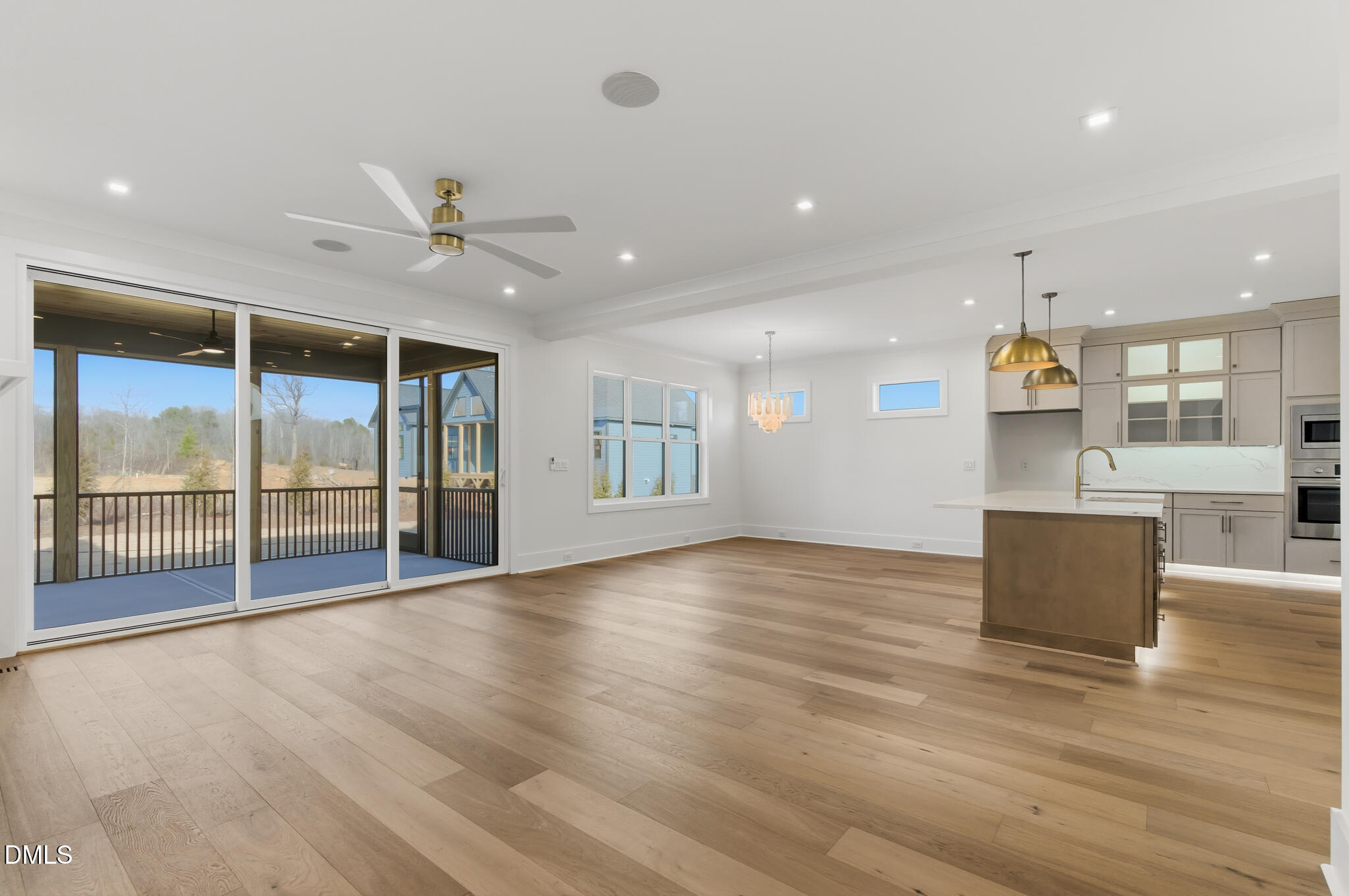 45 Harvest View Way Franklinton, NC 27525 - Photo 11 of 64 a view of an empty room with wooden floor and a window